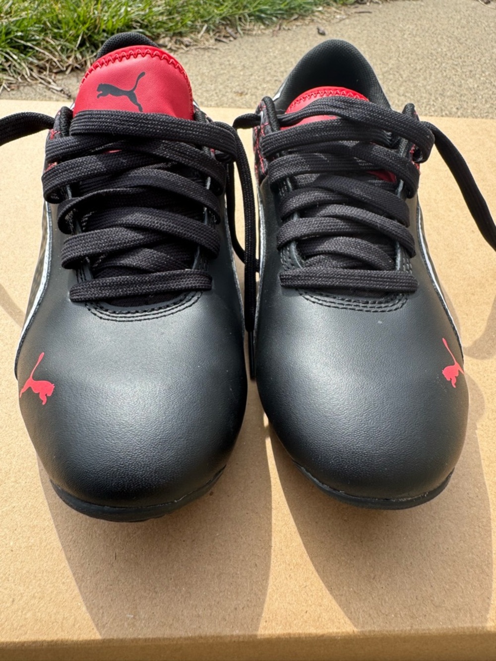 Puma Men’s Black Athletic Sneakers with Red Accents